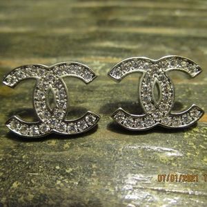 2017 silver toned Chanel Crystal studded e…